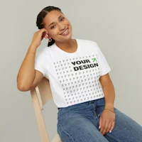 a woman wearing a t - shirt mockup sitting on a chair